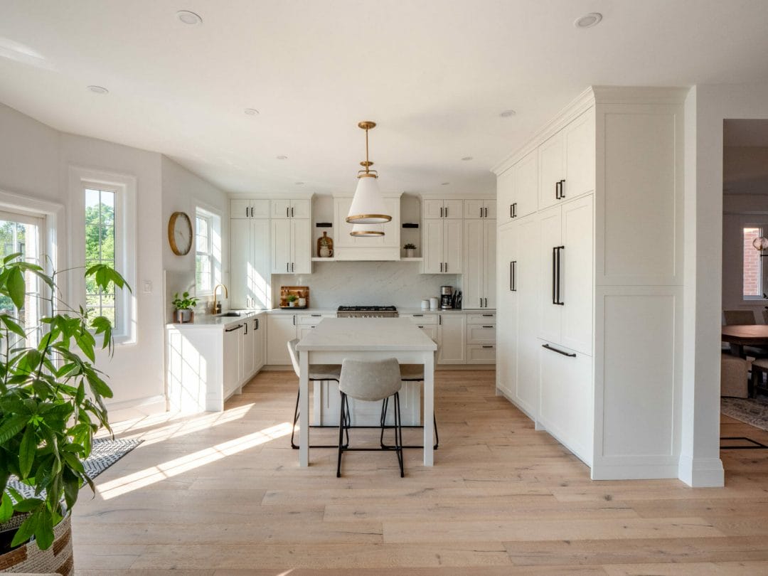 Warm & bright kitchen with natural light and white oak floors.